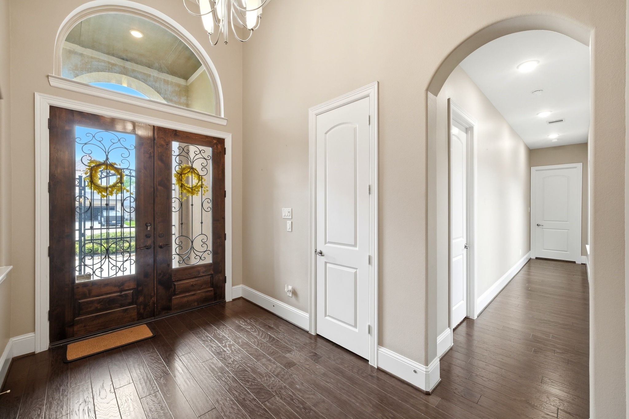5815 Stratton Woods Drive Spring, TX 77389 - Photo 7 of 45 a view of an entryway with wooden floor and door