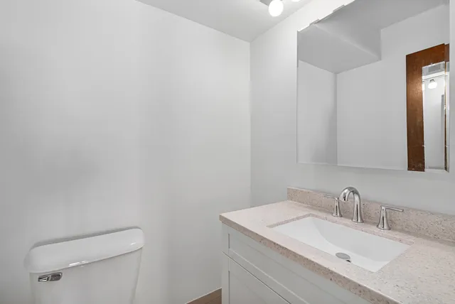 a bathroom with a sink and a toilet