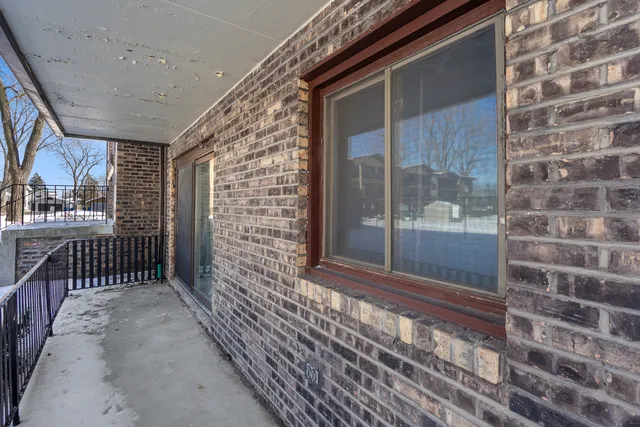 a view of a door and a window