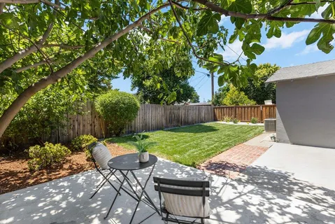 a view of a backyard with a garden