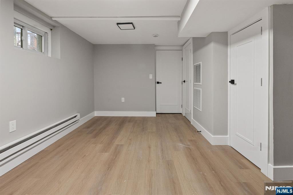76 Mission Street Montclair, NJ 07042 - Photo 43 of 50 a view of a room with wooden floor