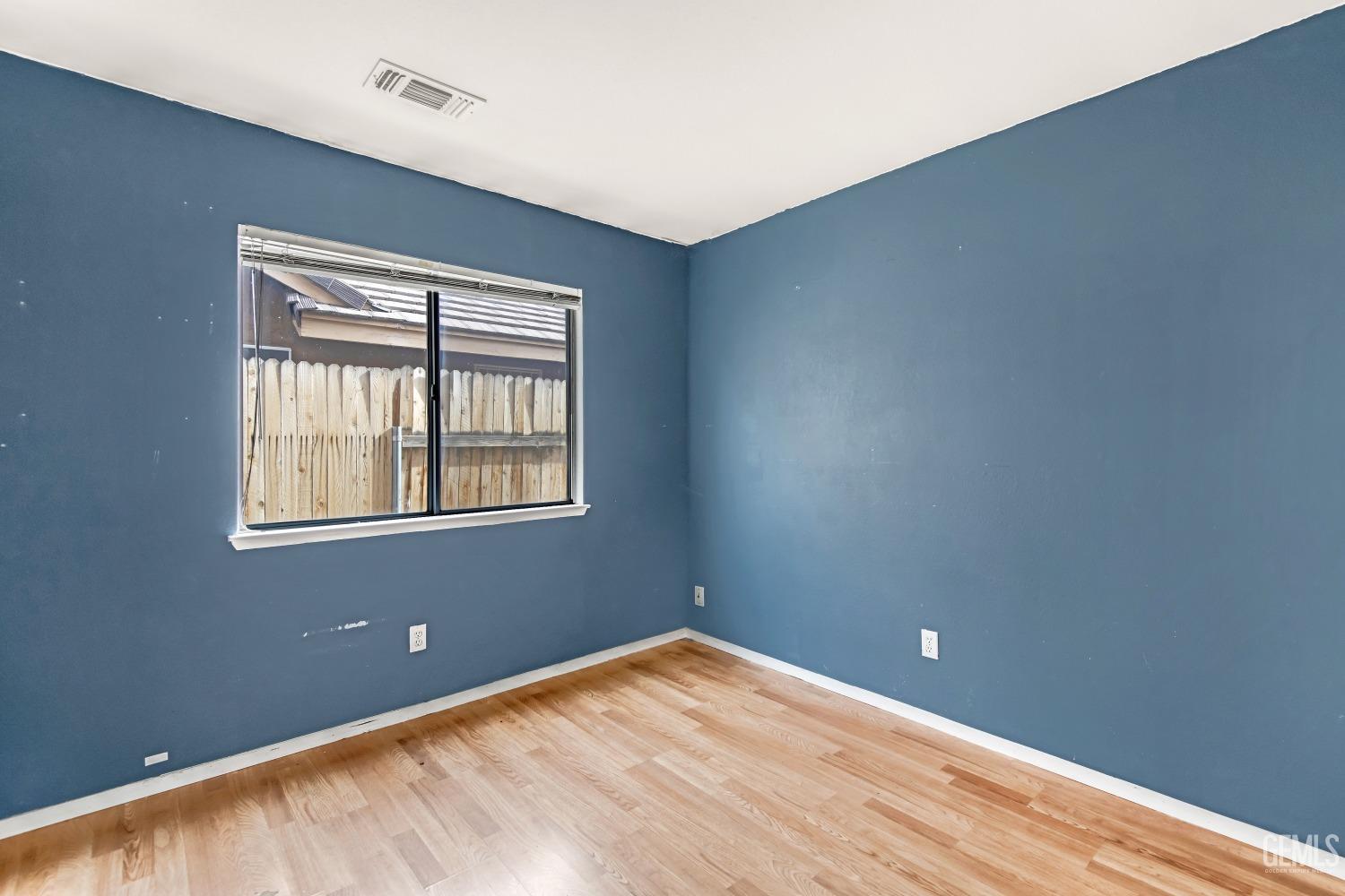 Undisclosed Address Bakersfield, CA 93313 - Photo 18 of 34 a view of an empty room with a window
