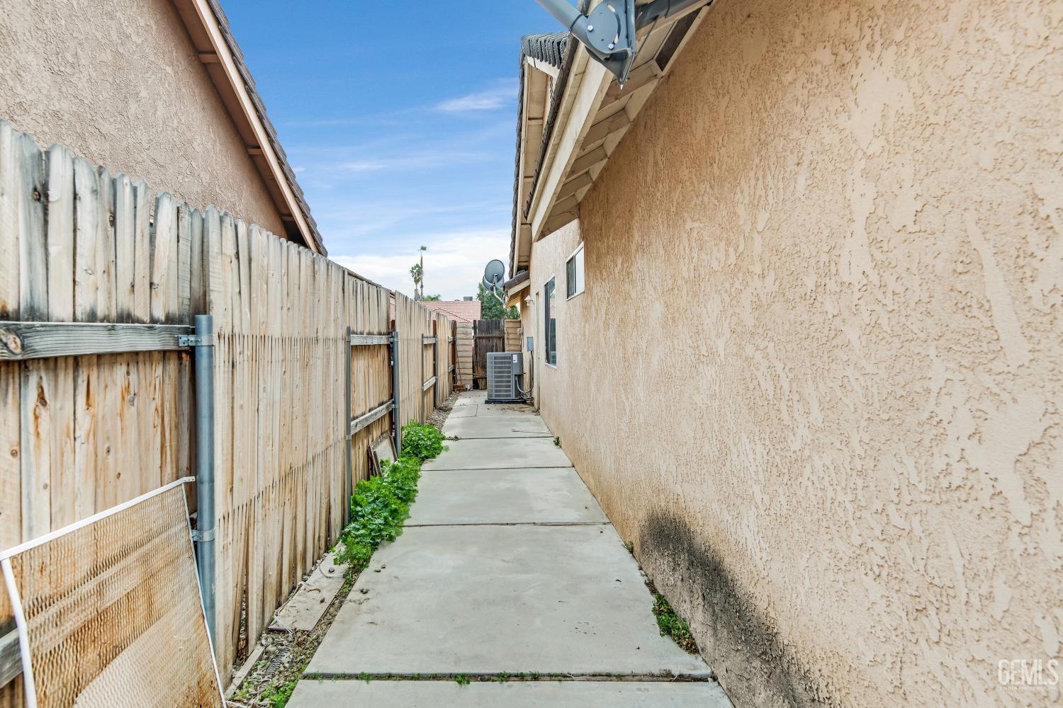 Undisclosed Address Bakersfield, CA 93313 - Photo 28 of 34 a view of a pathway of a building with stairs