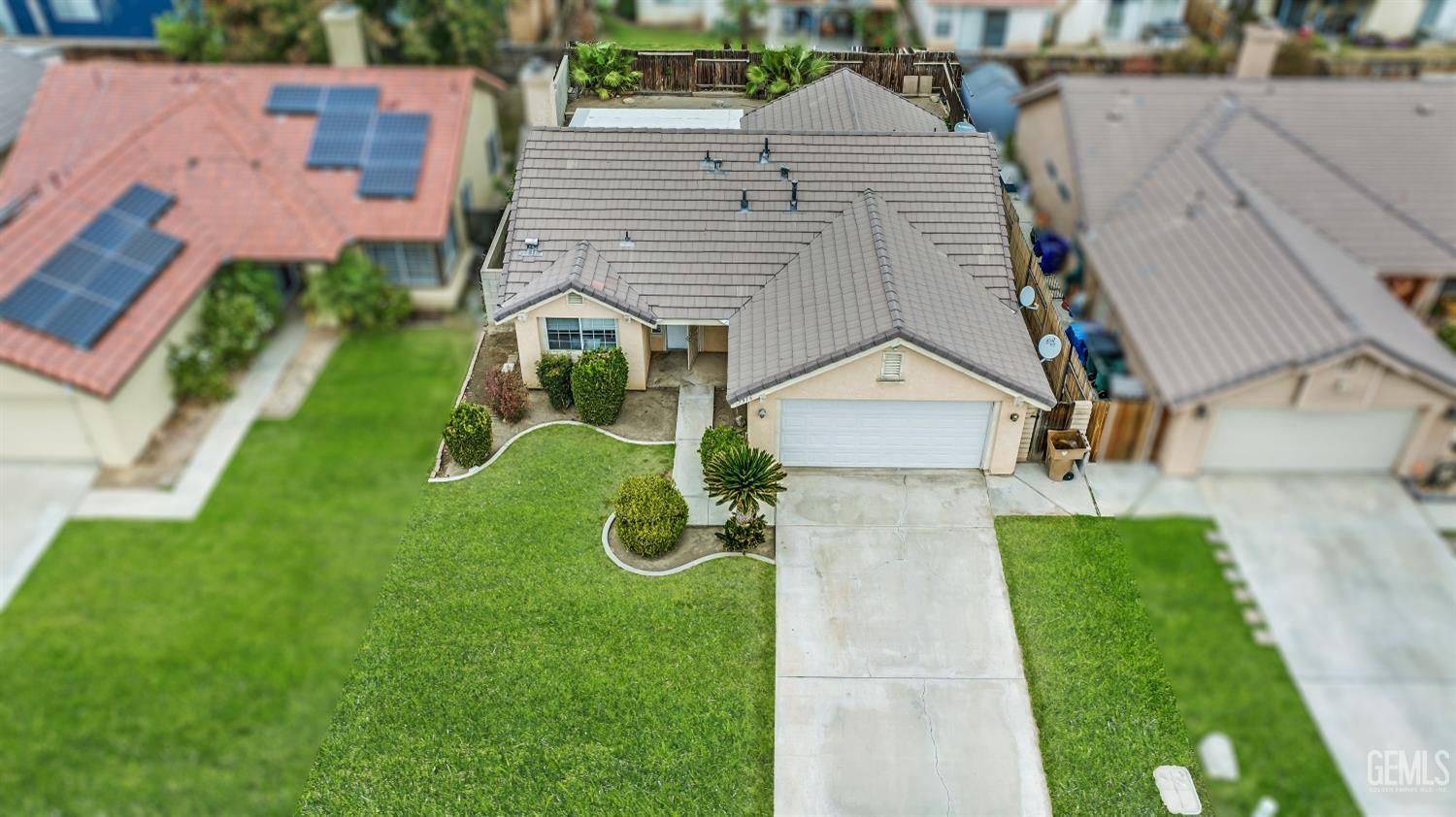 Undisclosed Address Bakersfield, CA 93313 - Photo 3 of 34 an aerial view of a house