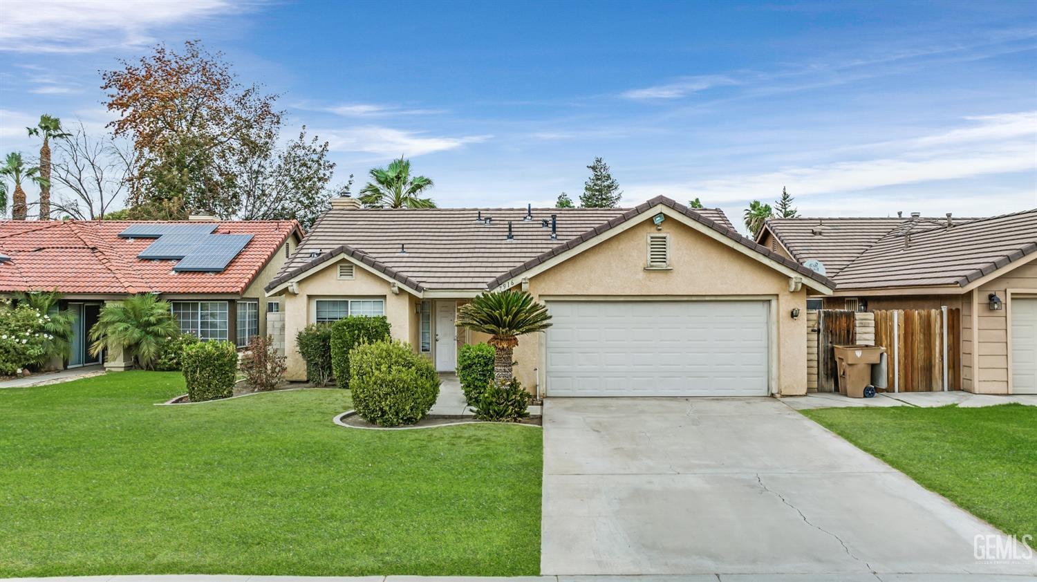 Undisclosed Address Bakersfield, CA 93313 - Photo 31 of 34 a view of a house with a yard and potted plants