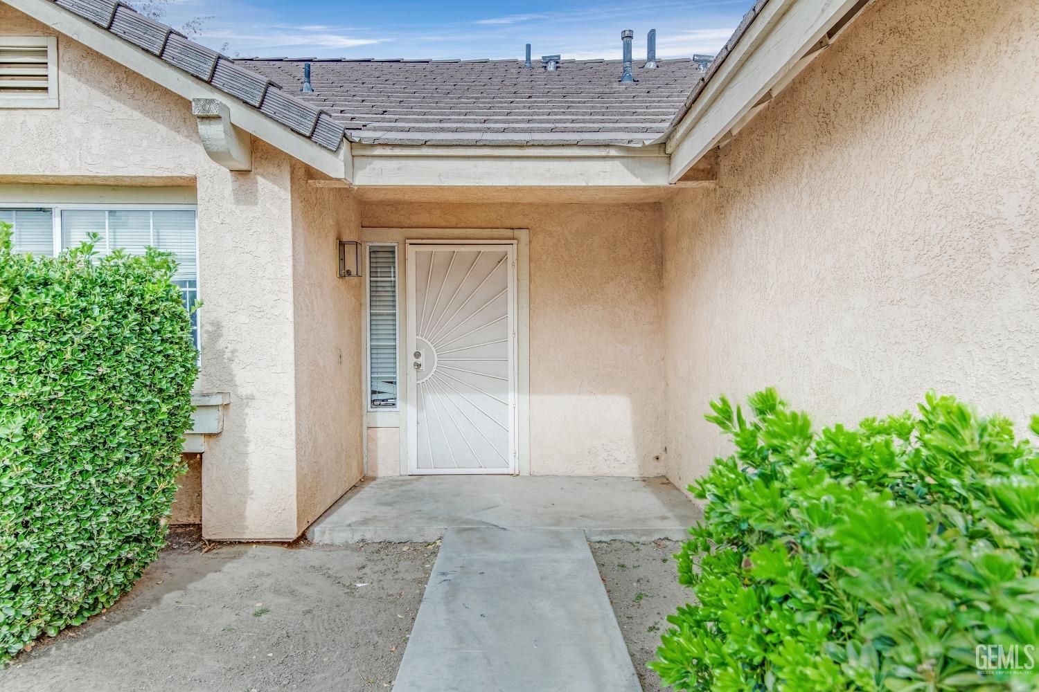 Undisclosed Address Bakersfield, CA 93313 - Photo 4 of 34 a view of backyard with potted plants