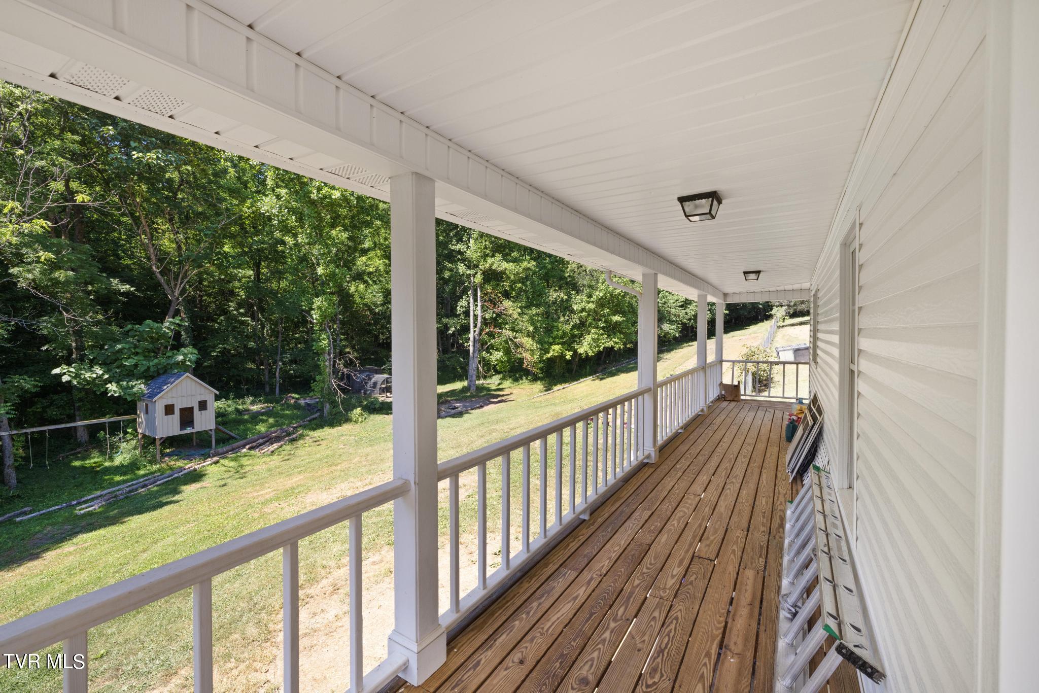 221 Judge Ben Allen Road Elizabethton, TN 37643 - Photo 7 of 44 Wrap around porch