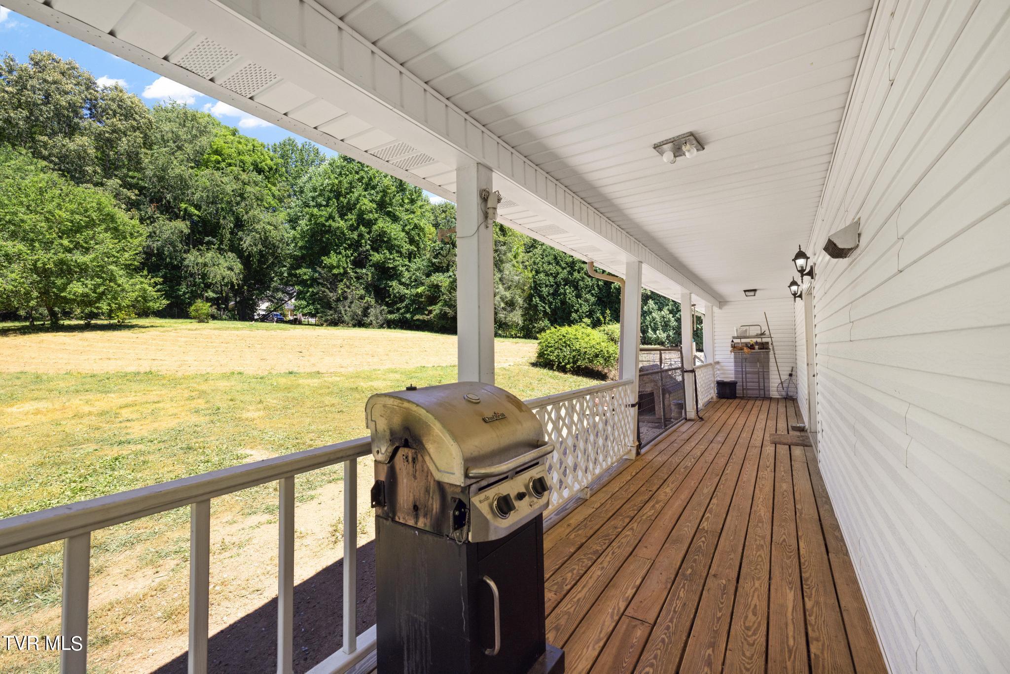 221 Judge Ben Allen Road Elizabethton, TN 37643 - Photo 8 of 44 Wrap around porch
