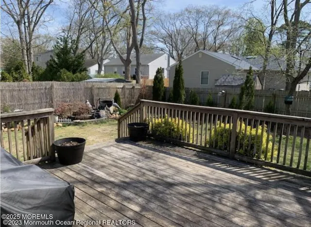 a view of a back yard of the house