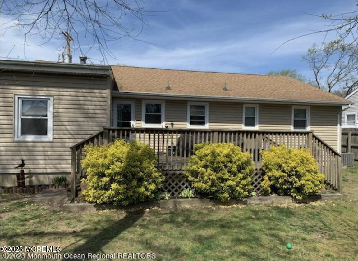 1220 Sunset Avenue Point Pleasant, NJ 08742 - Photo 10 of 10 a front view of a house with garden