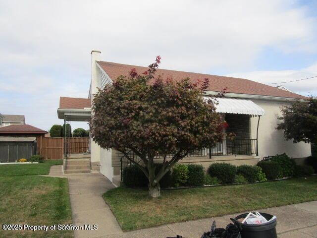 421 West Mary Street Old Forge, PA 18518 - Photo 2 of 15 a front view of a house with a yard