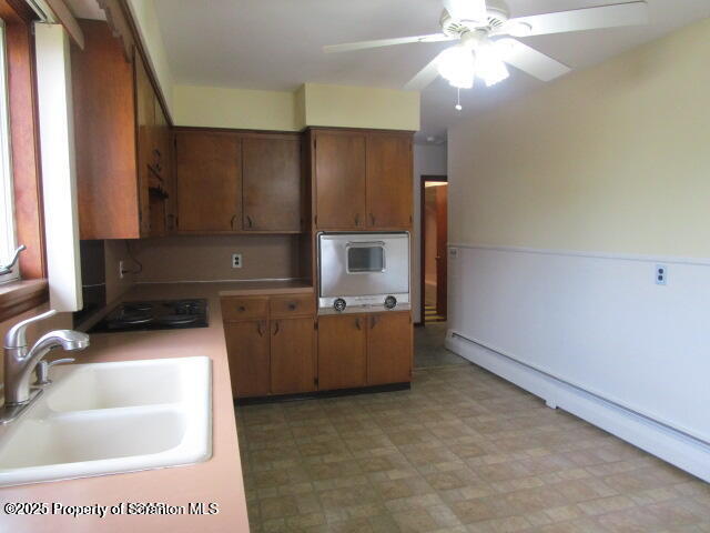 421 West Mary Street Old Forge, PA 18518 - Photo 3 of 15 a kitchen with a sink cabinets and window