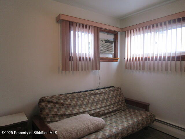 421 West Mary Street Old Forge, PA 18518 - Photo 5 of 15 a bedroom with a bed and window