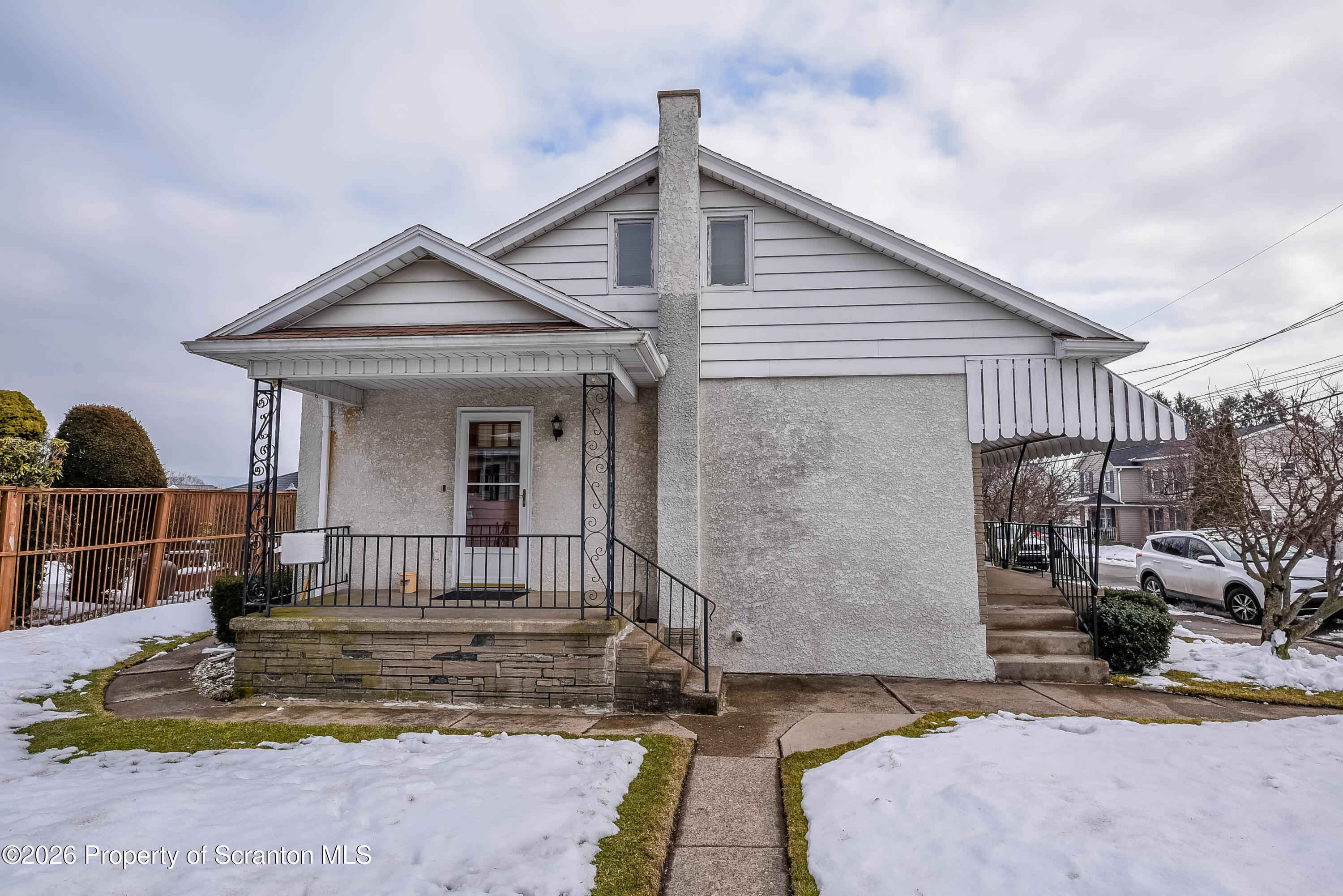 421 West Mary Street Old Forge, PA 18518 - Photo 6 of 26 side porch/yard