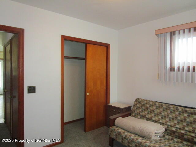 421 West Mary Street Old Forge, PA 18518 - Photo 7 of 15 a living room with furniture and a window