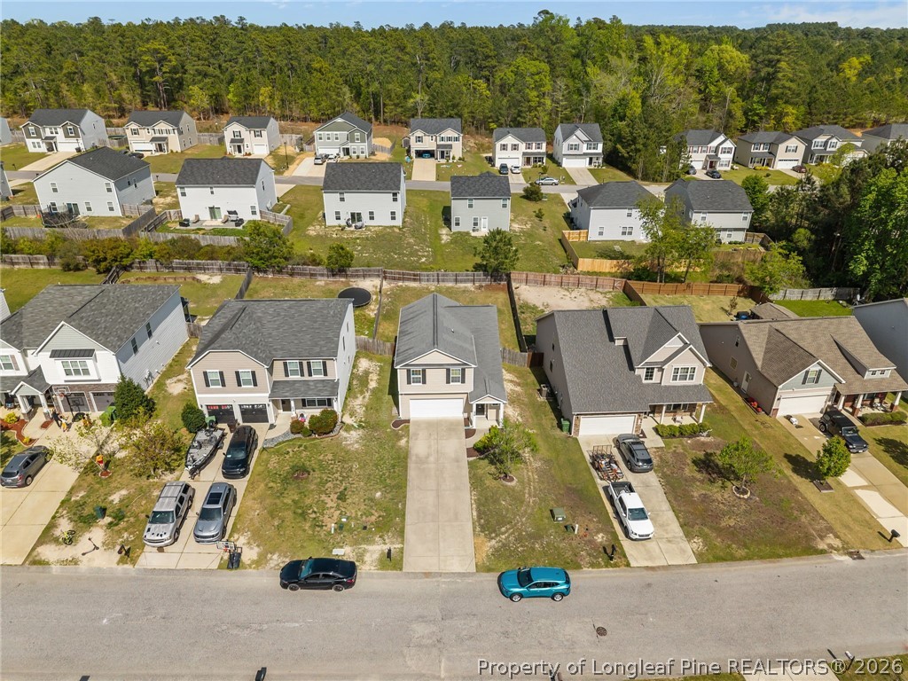 226 River Oak Street Spring Lake, NC 28390 - Photo 4 of 41 an aerial view of residential houses with outdoor space