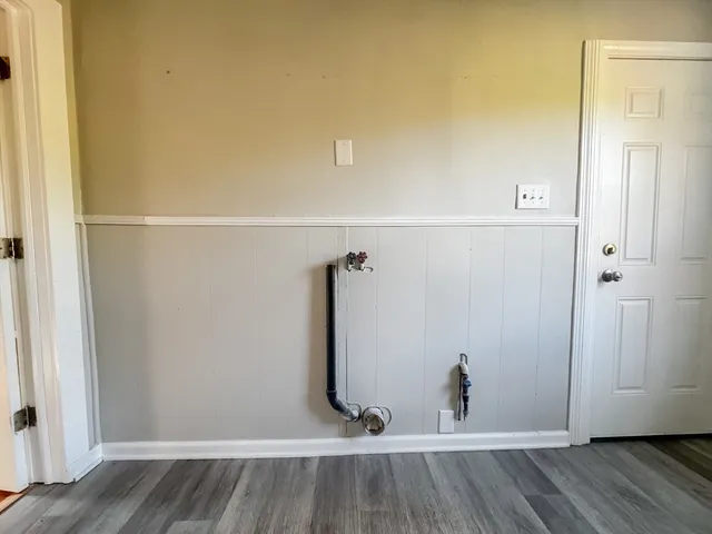 a view of small space with wooden floor