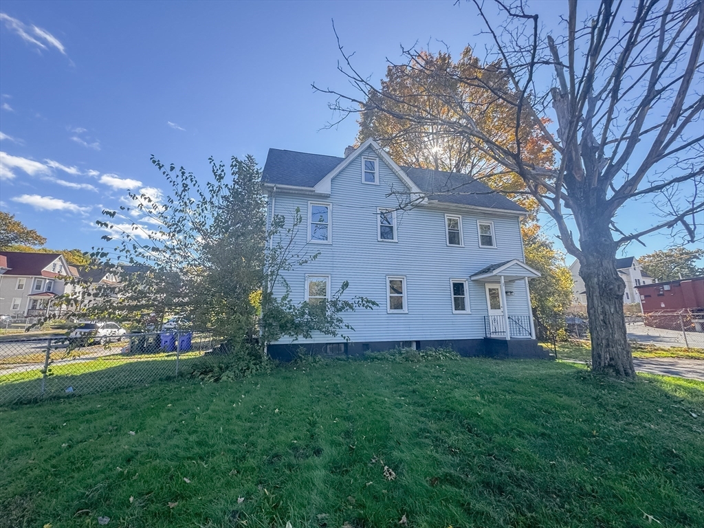 3-5 Noel Street Springfield, MA 01108 - Photo 2 of 28 a front view of house with yard and green space