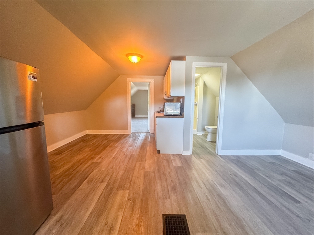 3-5 Noel Street Springfield, MA 01108 - Photo 22 of 28 a view of a living hall with wooden floor