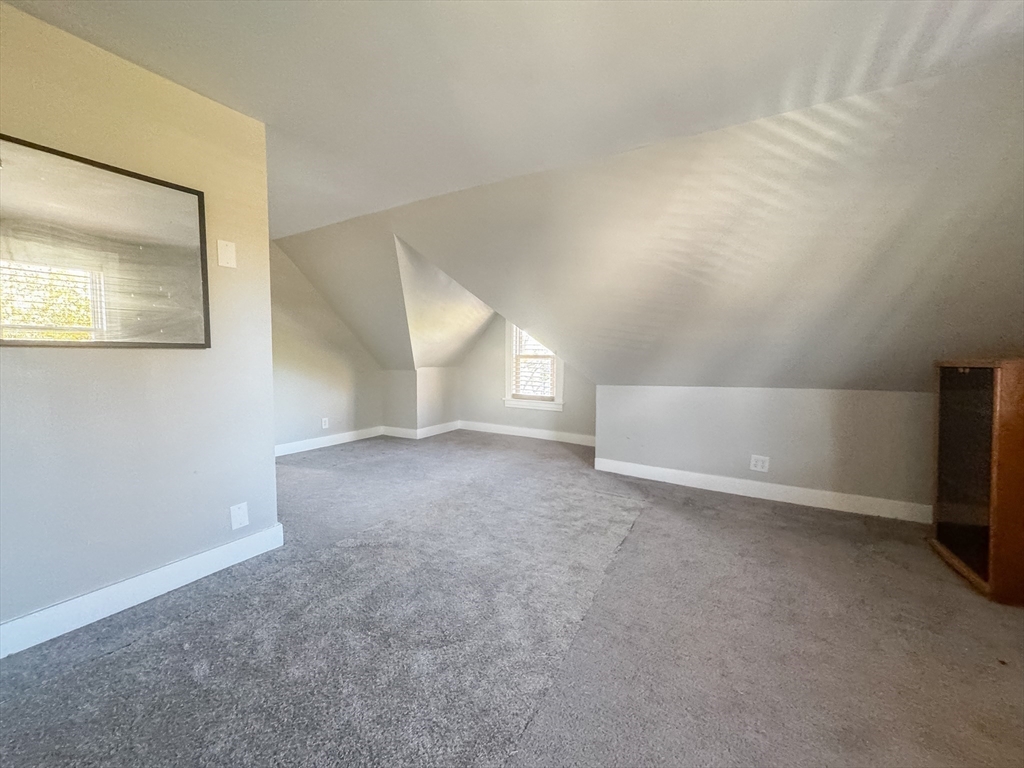 3-5 Noel Street Springfield, MA 01108 - Photo 27 of 28 a view of an empty room with a window