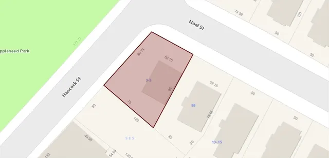 a view of a living room with a large window