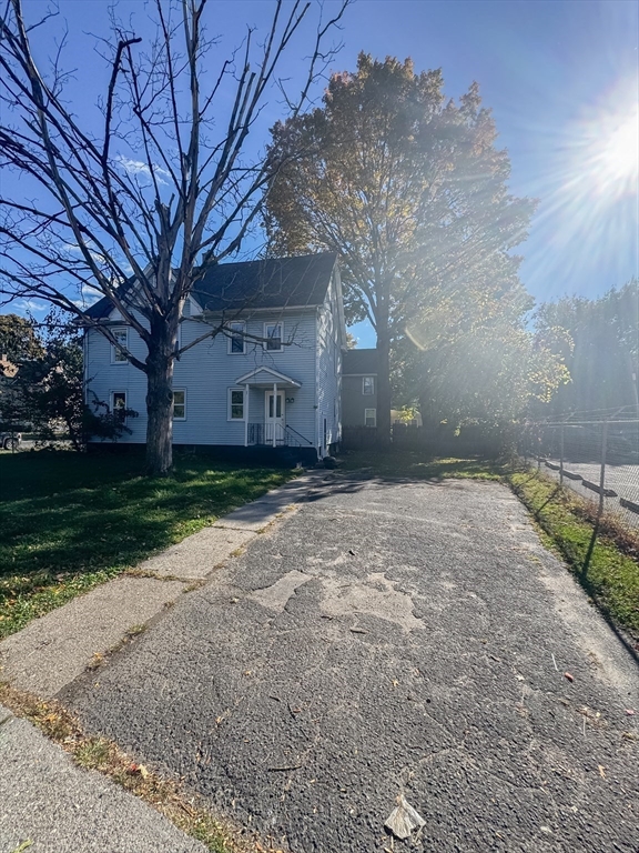 3-5 Noel Street Springfield, MA 01108 - Photo 3 of 28 a view of a house with a yard