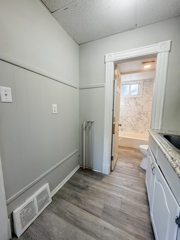 3-5 Noel Street Springfield, MA 01108 - Photo 8 of 28 a view of cabinets and wooden floor