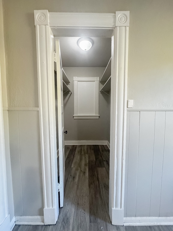 3-5 Noel Street Springfield, MA 01108 - Photo 9 of 28 a view of a hallway with wooden floor and staircase