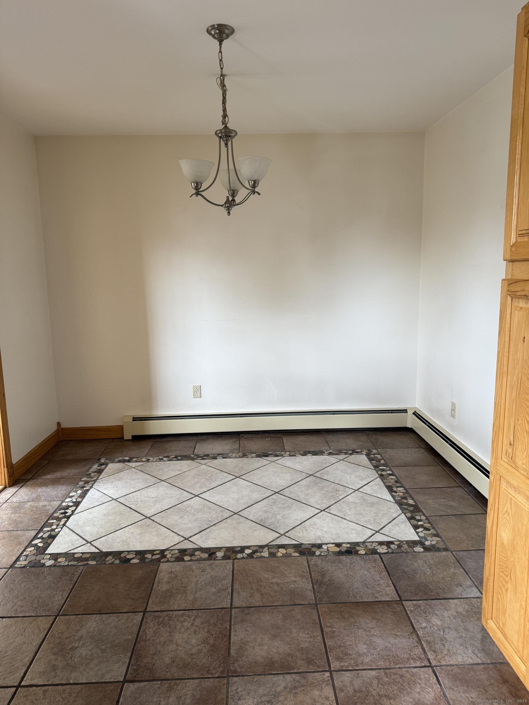 28 Galpin Street Naugatuck, CT 06770 - Photo 5 of 16 a view of a room with a chandelier