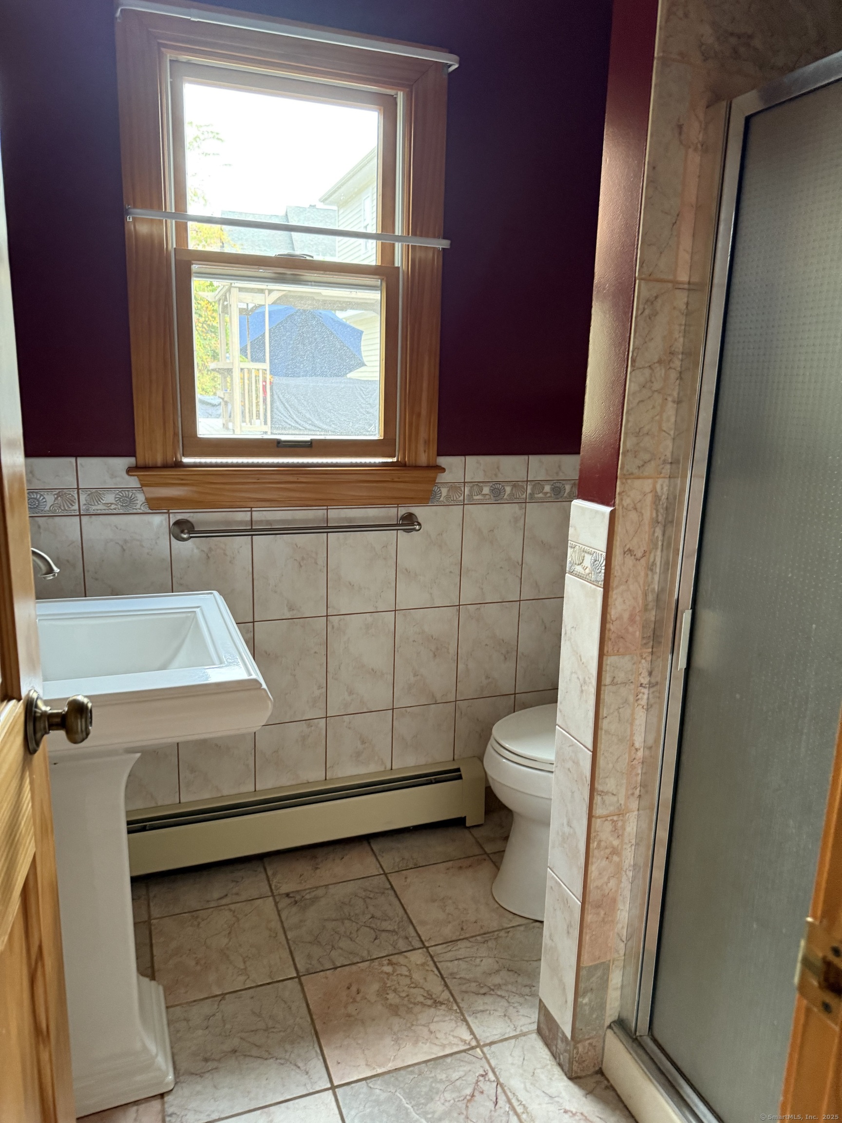 28 Galpin Street Naugatuck, CT 06770 - Photo 9 of 16 a bathroom with a sink toilet and tub