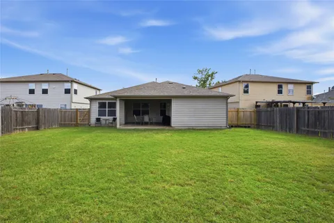 a view of a house with a garden