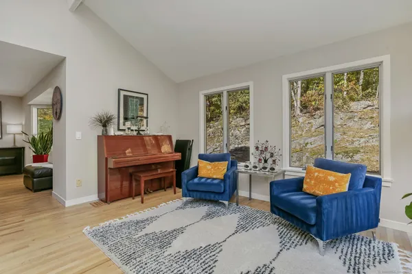 a living room with furniture and a window