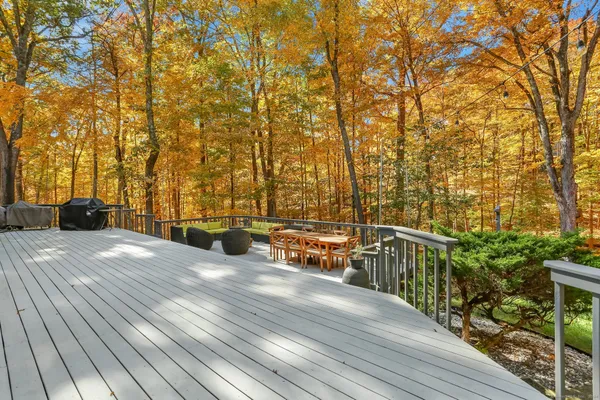 a view of a balcony with trees