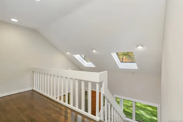 a view of hallway with stairs
