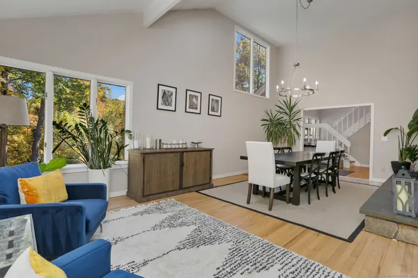 a living room with furniture and a table