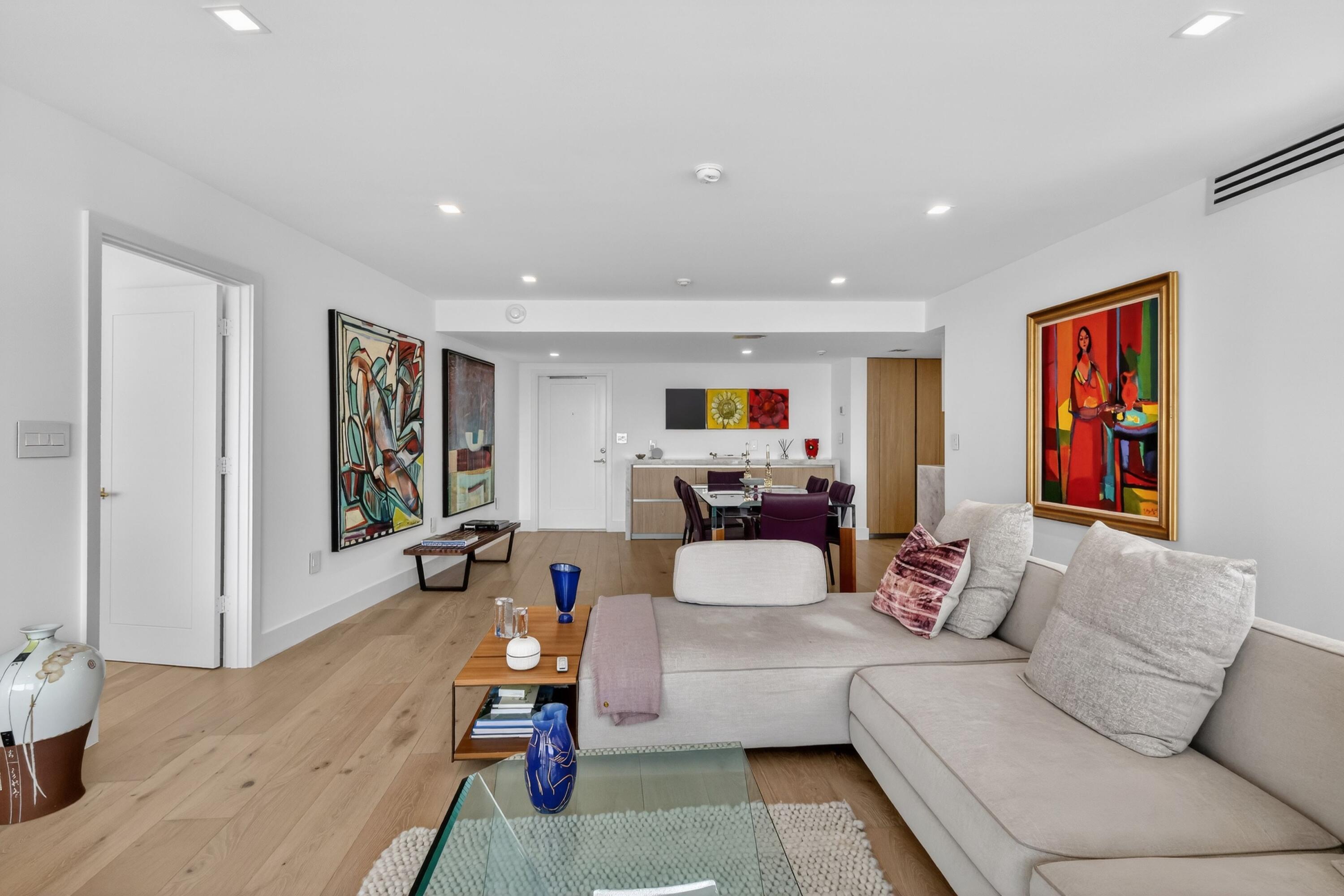2760 South Ocean Boulevard, Unit 508 Palm Beach, FL 33480 - Photo 10 of 26 a living room with furniture and a wooden floor