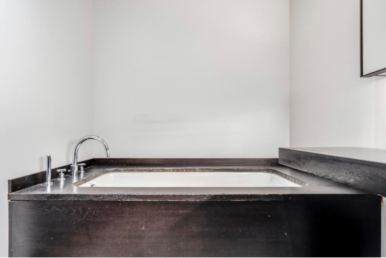 20 Pine Street, Unit 2205 Manhattan, NY 10005 - Photo 9 of 10 a close view of sink and tap