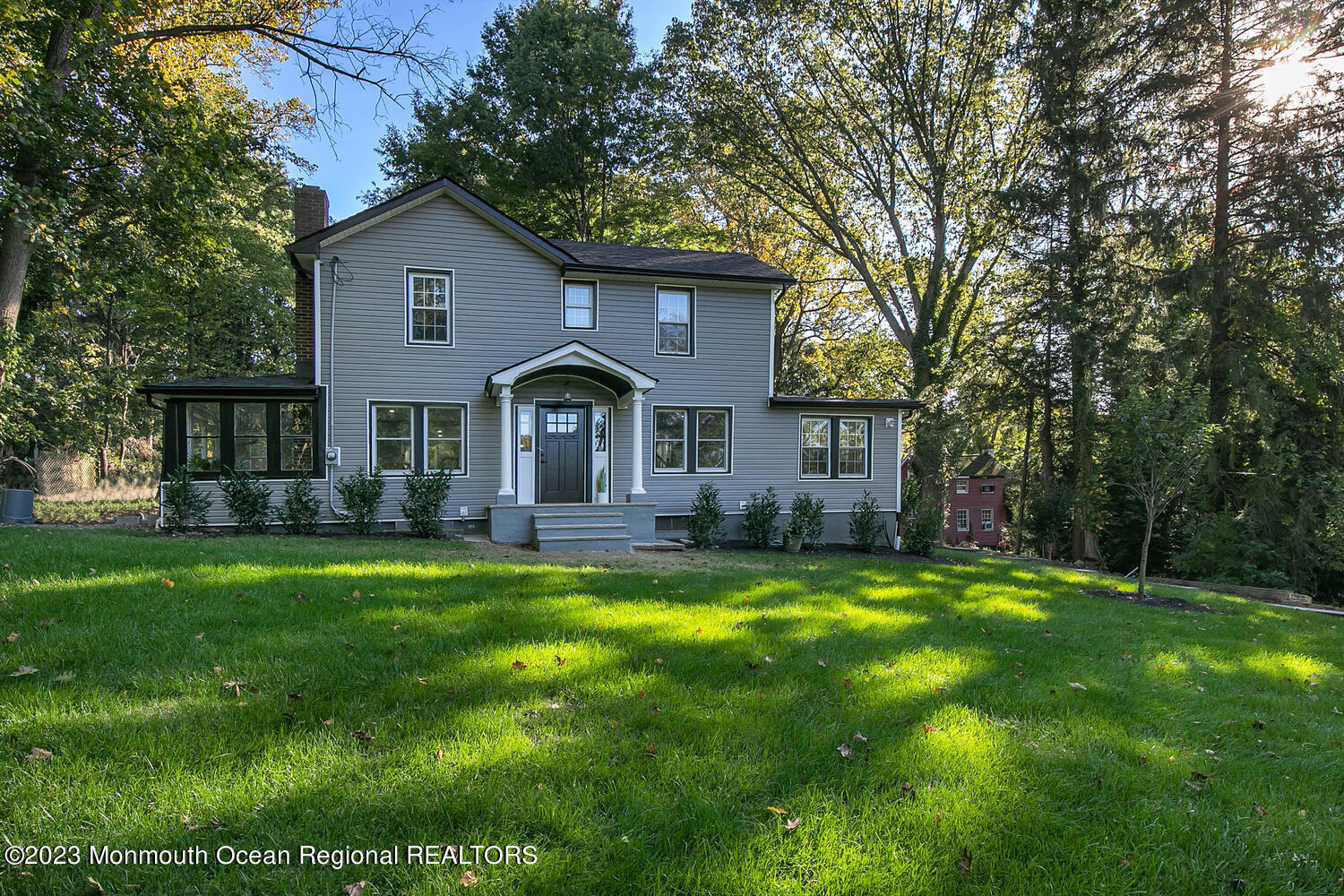 961 West Front Street Red Bank, NJ 07701 - Photo 1 of 46 a front view of a house with yard and green space