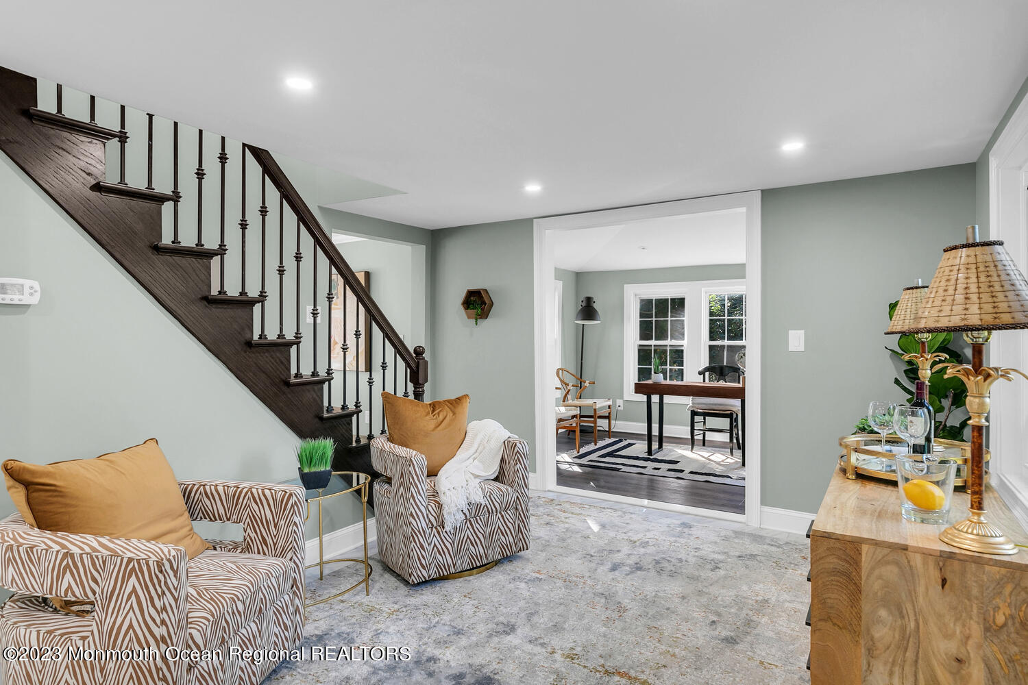 961 West Front Street Red Bank, NJ 07701 - Photo 19 of 46 a living room with furniture and a dining table with rug