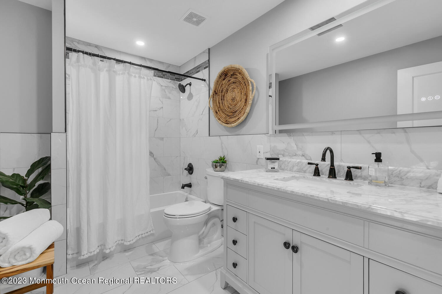 961 West Front Street Red Bank, NJ 07701 - Photo 26 of 46 a spacious bathroom with a toilet a sink and a mirror