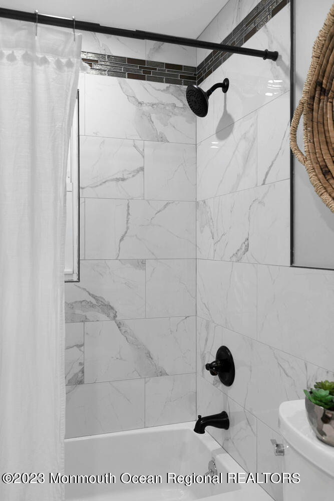 961 West Front Street Red Bank, NJ 07701 - Photo 27 of 46 a bathroom with a shower and a glass door