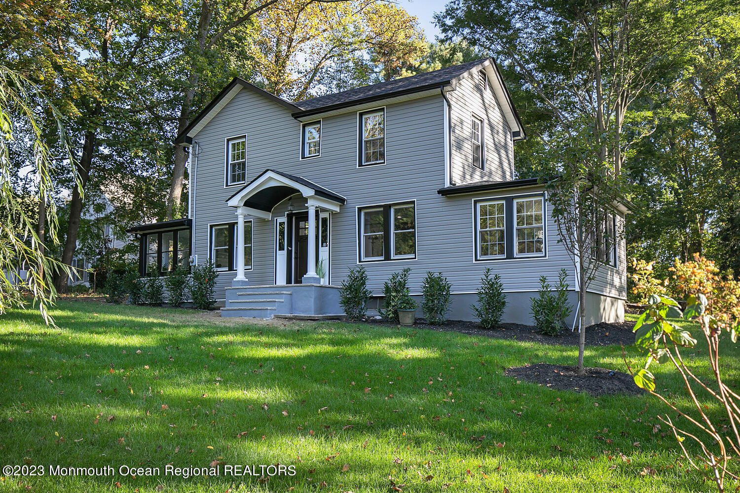 961 West Front Street Red Bank, NJ 07701 - Photo 42 of 46 a front view of a house with a garden