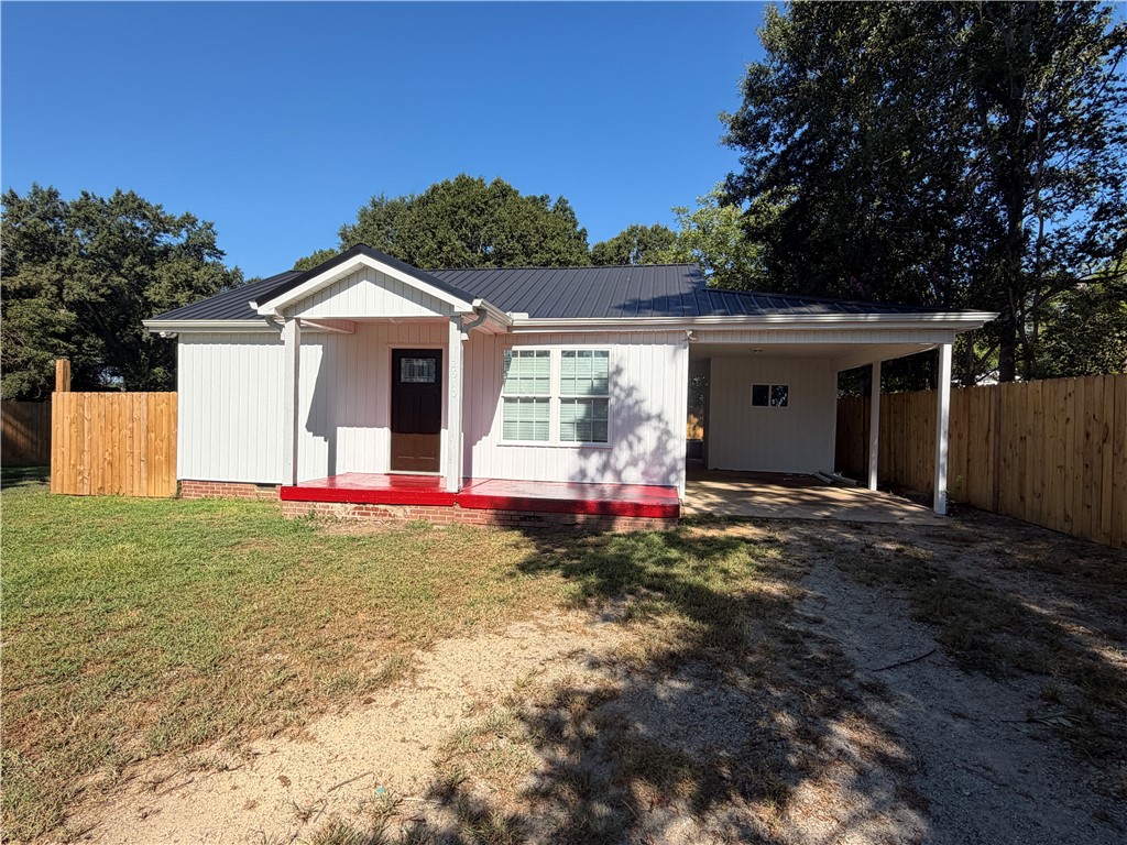 2910 Chambers Road Anderson, SC 29626 - Photo 16 of 16 Metal roofing and a covered carport highlight this classic single-story home design.