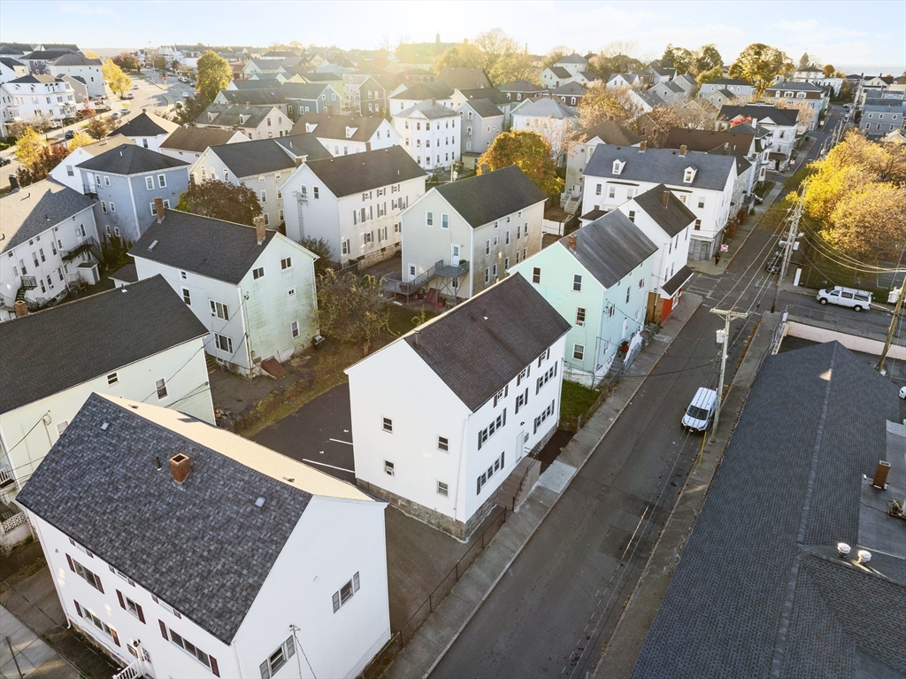173 Branch Fall River Fall River, MA 02721 - Photo 3 of 23 an aerial view of multiple houses with a terrace