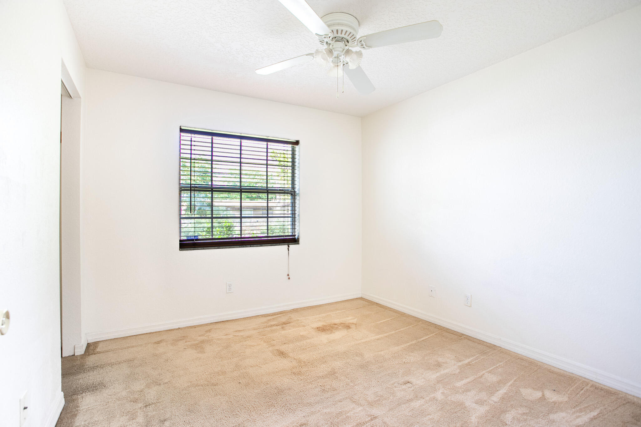 441 Lucas Road Merritt Island, FL 32953 - Photo 12 of 17 an empty room with a window
