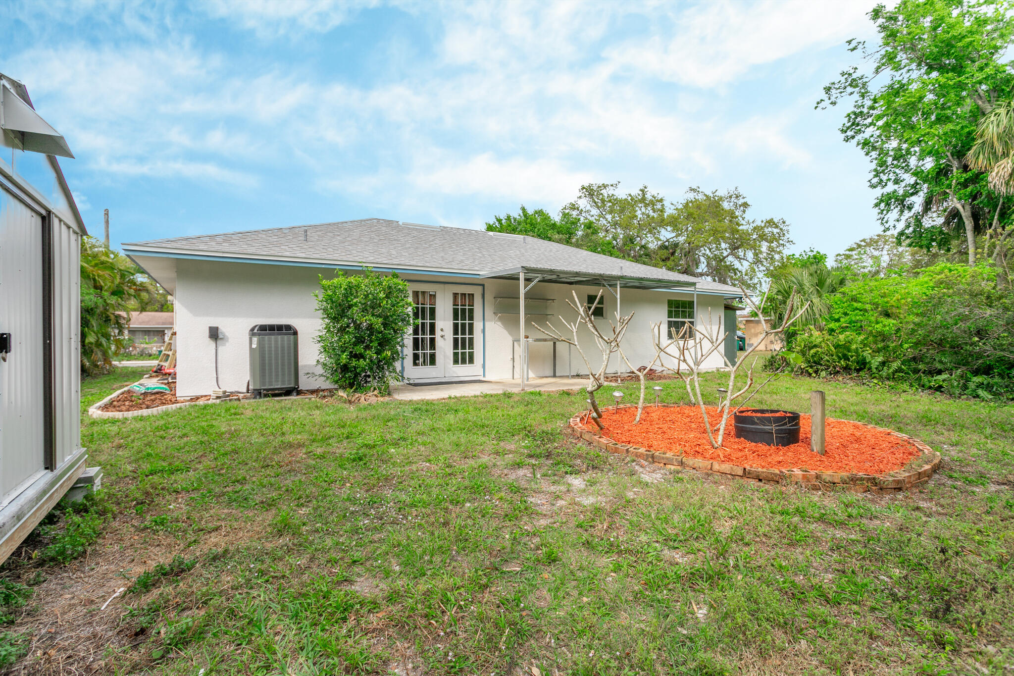 441 Lucas Road Merritt Island, FL 32953 - Photo 13 of 17 front view of a house with a yard