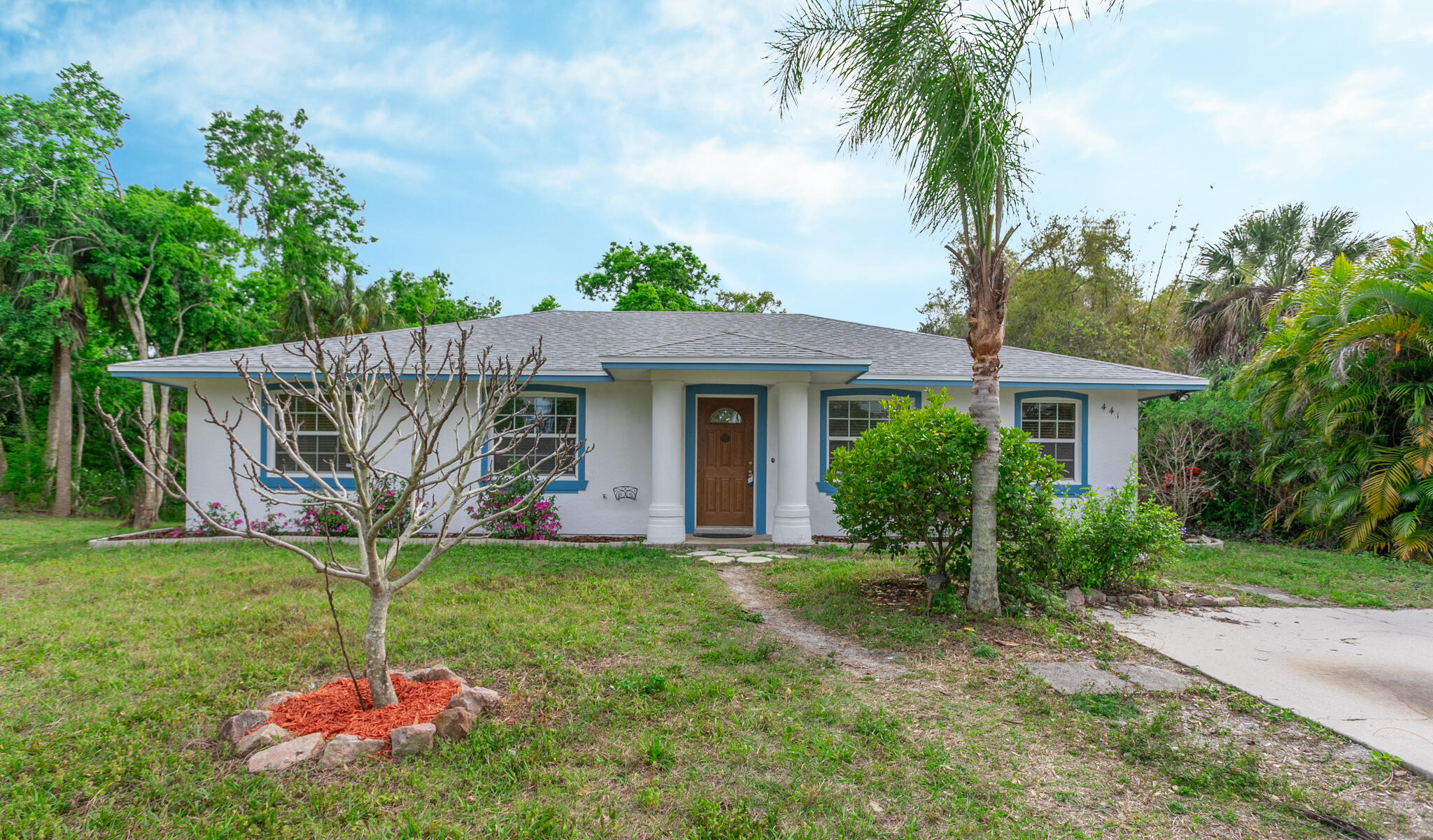 441 Lucas Road Merritt Island, FL 32953 - Photo 17 of 17 a house view with a garden space