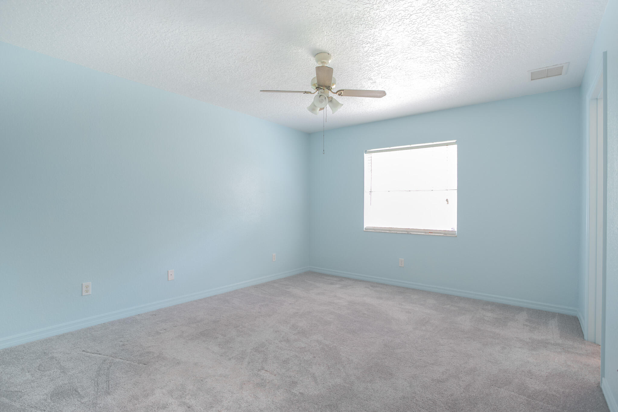 441 Lucas Road Merritt Island, FL 32953 - Photo 6 of 17 an empty room with a window
