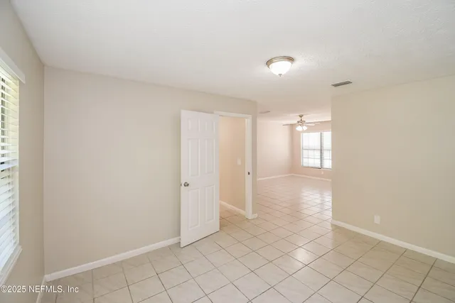 a view of an empty room and window