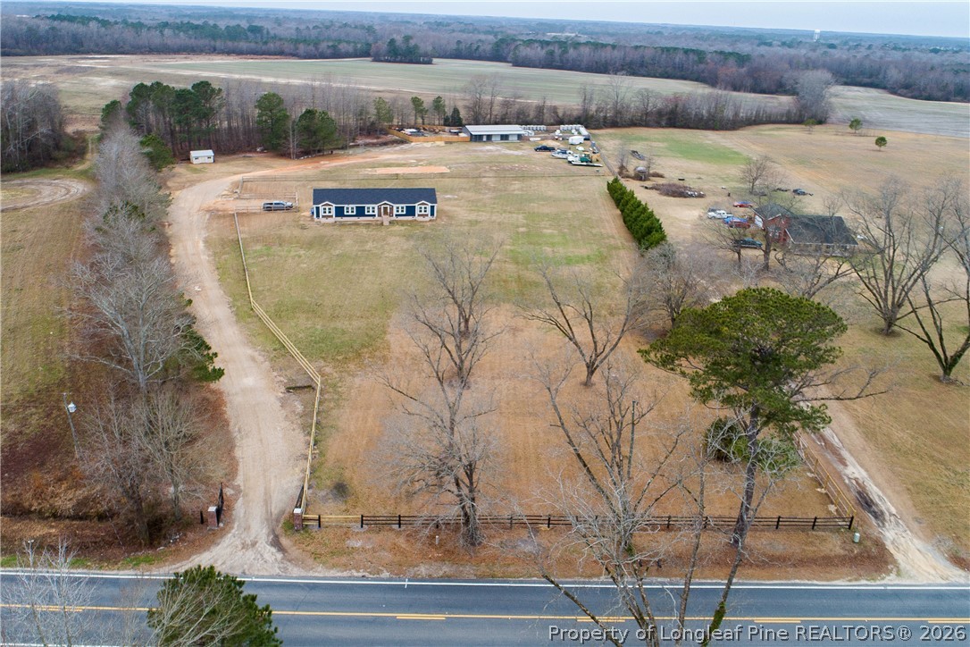 Fullly fenced 5.66 acres with pond
